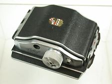 To jest Rollex 6x7 do modelu III. Występowały wyłącznie w kolorze czarnym. Akurat ten z mocowaniem do 6x9.